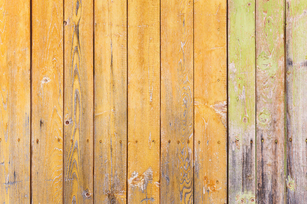Old wood on barn door with a ragged colors - Фото, изображение