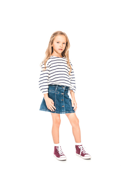 full length view of kid in denim skirt isolated on white - Fotó, kép