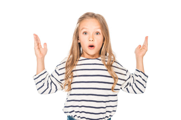 front view of shocked kid in casual outfit isolated on white - Valokuva, kuva