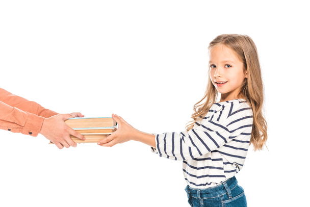 Teilansicht von zwei Kindern mit Büchern isoliert auf weiß - Foto, Bild