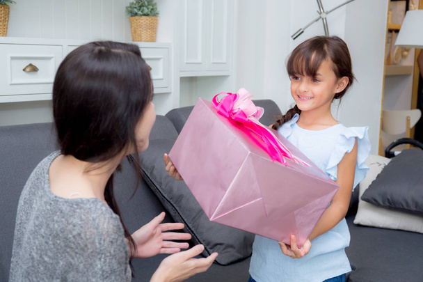 happy of mother and daughter asian with gift with pink ribbon an - Photo, image