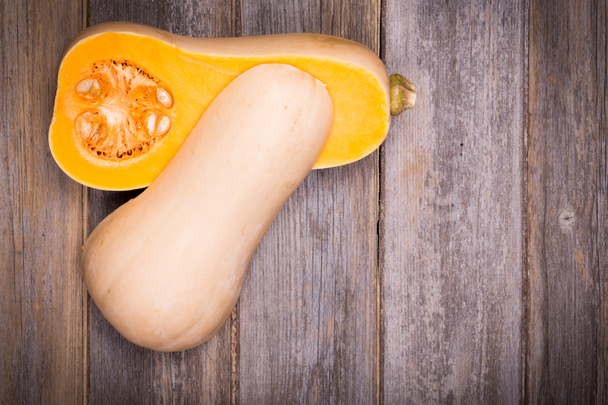 Butternut squash over old wood - Photo, Image