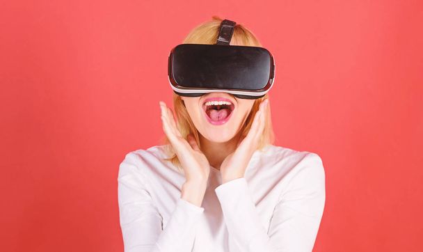 Excited smiling businesswoman wearing virtual reality glasses. Young woman using a virtual reality headset with conceptual network lines. Woman wearing virtual reality goggles. - Foto, imagen