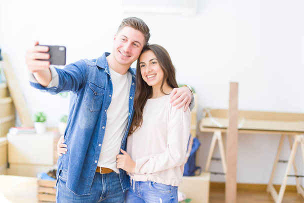 Beautiful young couple smiling happy taking a selfie photo - Foto, immagini