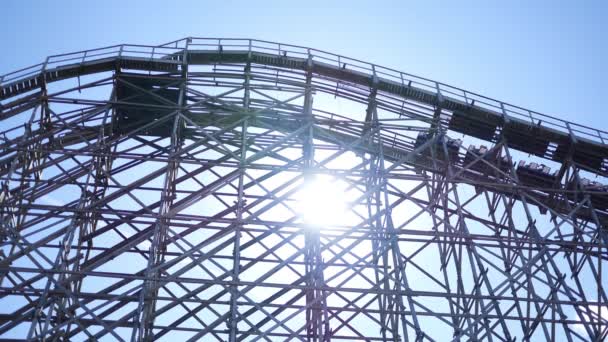 Cinematic roller coaster climbs up hill and descends - Felvétel, videó