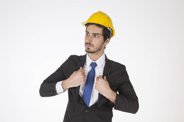 Portrait of an architect builder , serious civil engineer working white background. - Foto, immagini