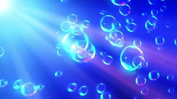 Rainbow bubble on transparent water background. Air bubble in deep blue sea. - Footage, Video