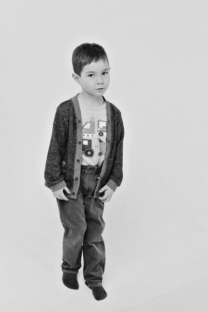 portrait of a happy child on a white background. concept of childhood, healthcare, IVF - Fotó, kép