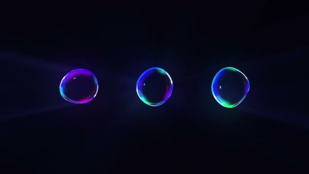 Rainbow bubble on transparent water background. Air bubble in black background. - Footage, Video