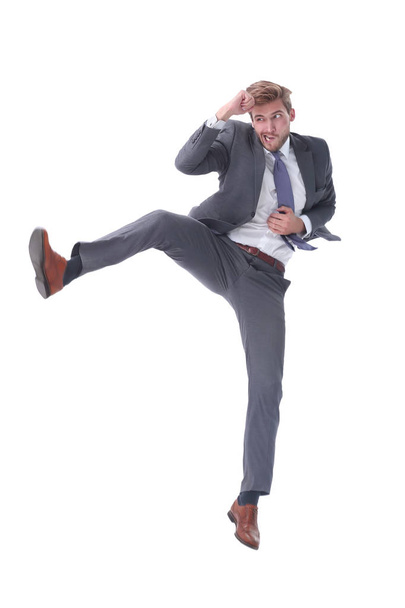in full growth. young businessman jumping high. - Foto, imagen