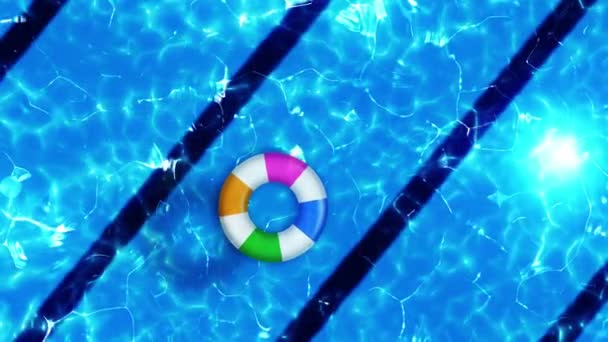 Aerial view of swimming pool. Colorful inflatable ring donut toy. Relaxation and healing concept. - Footage, Video