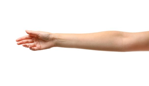 Young woman reaching hand for shake on white background, closeup - Foto, imagen