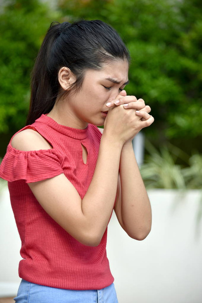 An Asian Teen Girl In Prayer - Valokuva, kuva