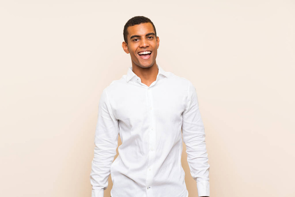 Young handsome brunette man over isolated background with surprise facial expression - Photo, image