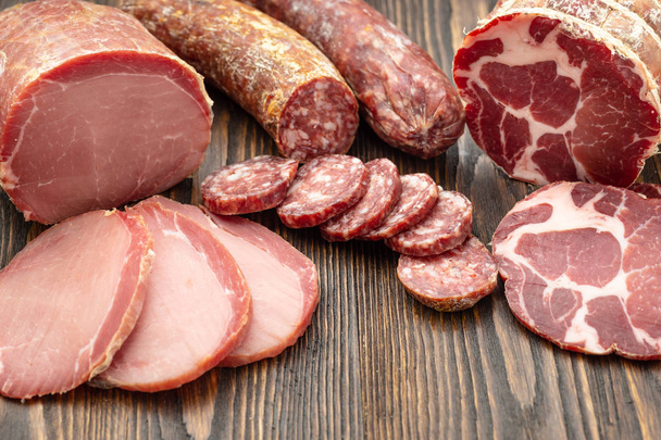 Antipasto platter cold meat with slices ham, beef jerky, salamon - Фото, зображення
