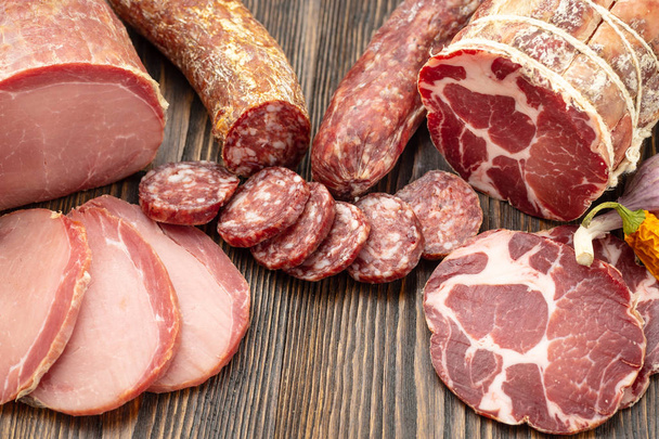Antipasto platter cold meat with slices ham, beef jerky, salamon - Zdjęcie, obraz