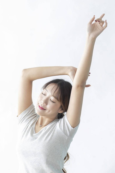 happy asian girl stretching hands - Valokuva, kuva