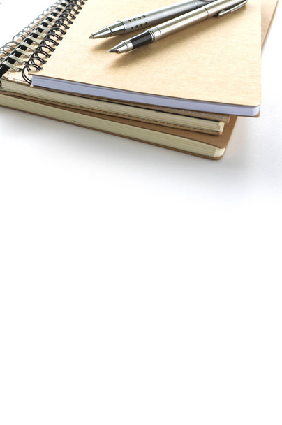 stack of notebooks on white background - Фото, изображение