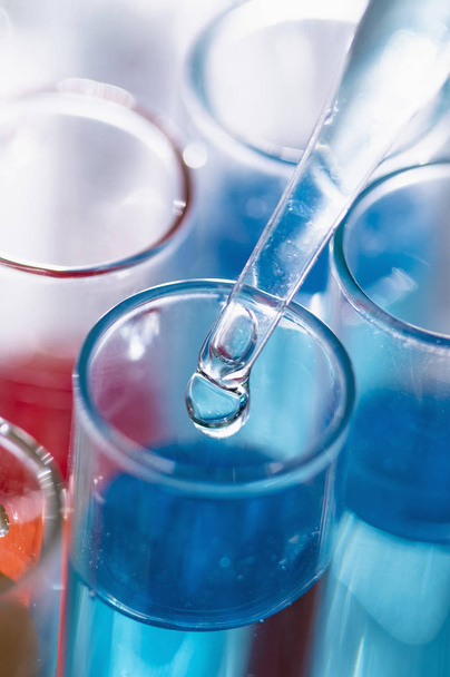 flasks with bright liquids in chemical laboratory - Foto, Imagem