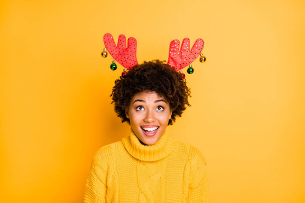 Close-up portrait of her she nice attractive charming cute lovely funny cheerful cheery wavy-haired girl wearing red deer horns isolated over bright vivid shine vibrant yellow color background - Foto, immagini