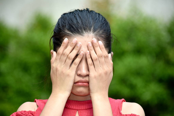 An Ashamed Pretty Asian Person - Photo, image