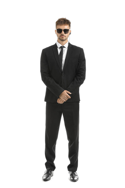 Handsome security guard on white background - Photo, Image