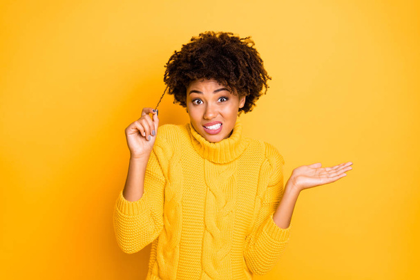 Photo of trendy misunderstanding dandruff haired girlfriend wearing yellow jumper not knowing how to care about hair while isolated with bright color background - Fotoğraf, Görsel