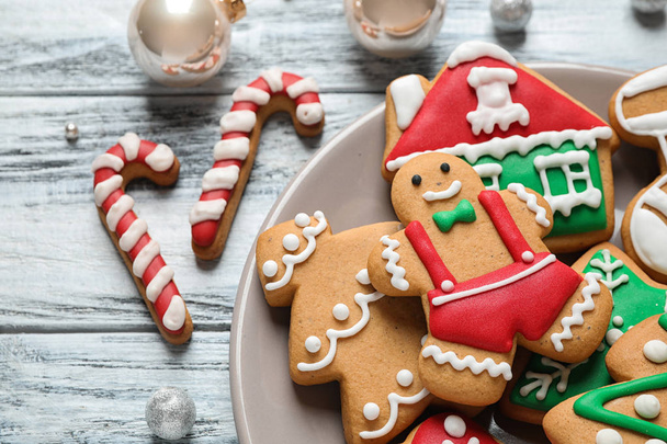 Tasty homemade Christmas cookies on white wooden table, closeup view - 写真・画像