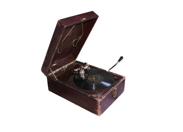 Παλιά vintage μουσική πικάπ σε κουτί απομονώνεται σε λευκό φόντο. Περιστρεφόμενοι δίσκοι ήχου βινυλίου. - Φωτογραφία, εικόνα