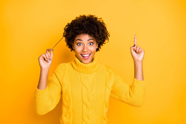 Close-up portrait of her she nice attractive lovely charming cute cheerful brainy wavy-haired girl pointing finger up genius idea isolated over bright vivid shine vibrant yellow color background - Foto, Bild