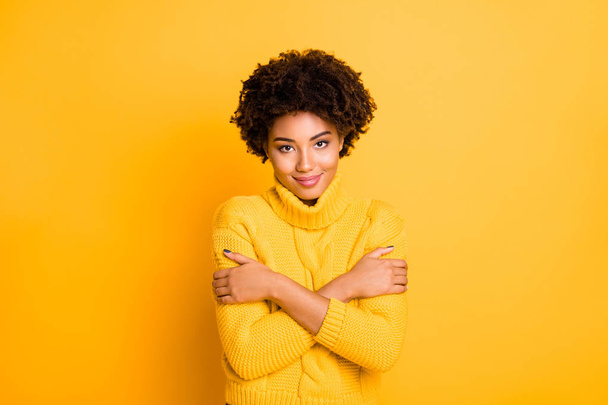 Photo of pretty dark skin lady holding hands on shoulders want some hugs wear warm knitted sweater isolated yellow background - Fotoğraf, Görsel
