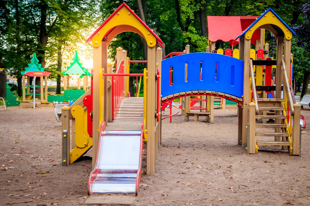 City playground. Children's entertainment. Slides and swings. - Photo, Image