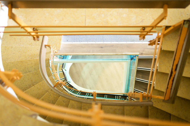 Vertigo concept. Ladder hole seen from above. - Photo, Image