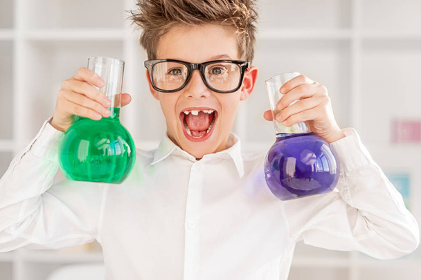 Crazy little chemist with flasks - Foto, Bild