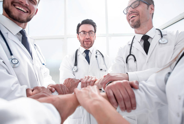 close up.a group of doctors standing in a circle - 写真・画像