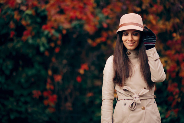 Woman Wearing Trench Coat and a Hat Fashion Portrait - Фото, зображення
