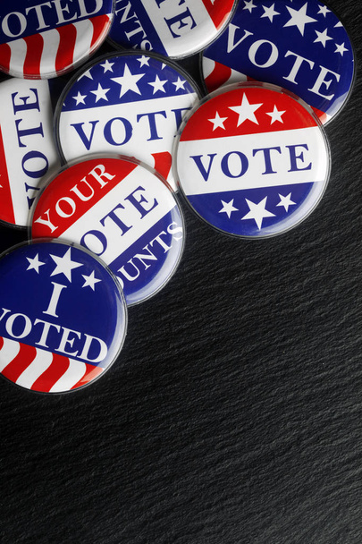 Red, white, and blue vote buttons background - Photo, Image