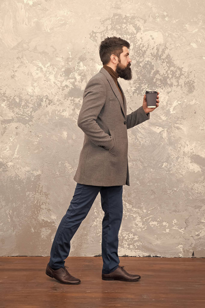 Careful with coffee cup. Coffee break concept. Business people fashion style. Smart casual style clothes for office life. Best coffee served for him. Man handsome bearded businessman hold cup coffee - Fotografie, Obrázek