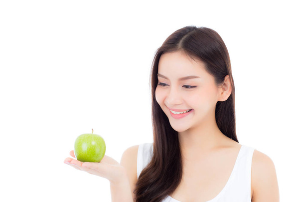 Hermosa joven asiática mujer sonrisa y celebración verde manzana fruta
  - Foto, Imagen