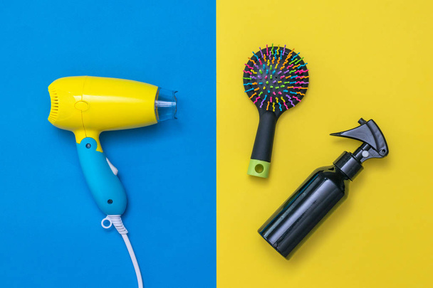 Hair care products on yellow and blue background. - Photo, Image