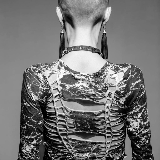 Woman with shaved head, brutal look - Фото, изображение