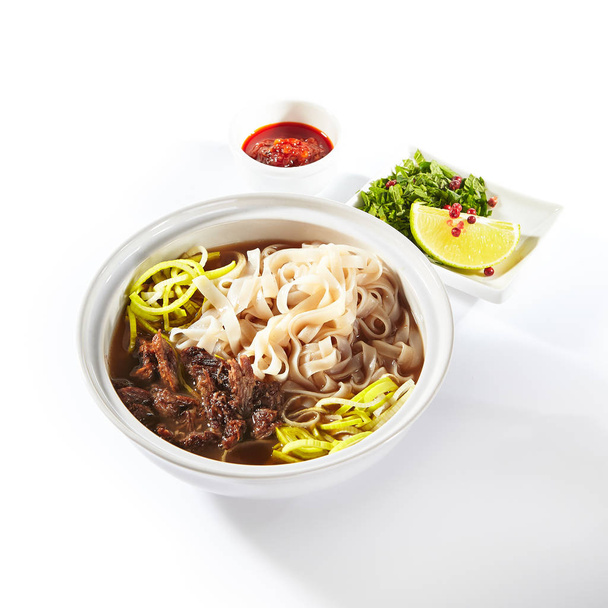 Traditional Vietnamese Soup Pho Bo with Beef Meat Isolated - Foto, Bild