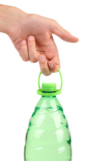 Hand holds plastic bottle. - Foto, afbeelding