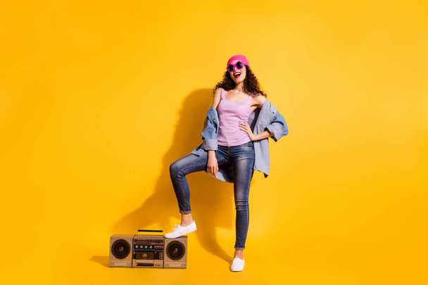 Full length photo of funky lady with big tape recorder ready for party beginning wear casual trendy clothes isolated yellow color background - Valokuva, kuva