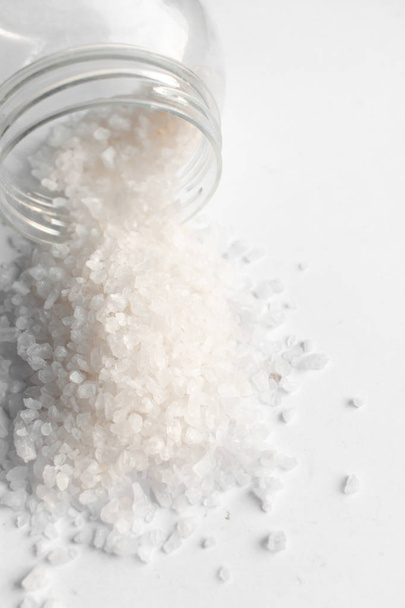 scattered flavored salt on white background - Photo, Image