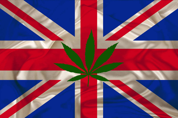 zelený list konopí a krásná hedvábná vlajka Velké Británie, koncepce lékařského konopí, legalizace drog, zločin obchodníků s drogami, uzavření - Fotografie, Obrázek