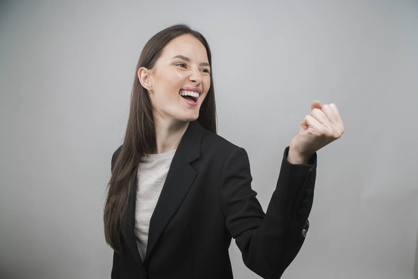 Smiling Female Business Leader over gray background - Foto, Imagem