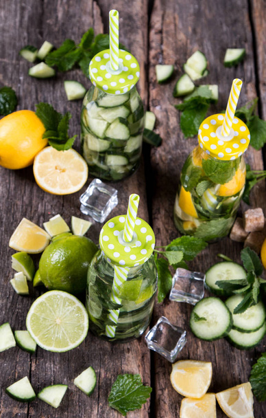 Home made lime, cucumber, raspberry and lemon drinks. Mojito mix. Summer concept - Foto, Imagen