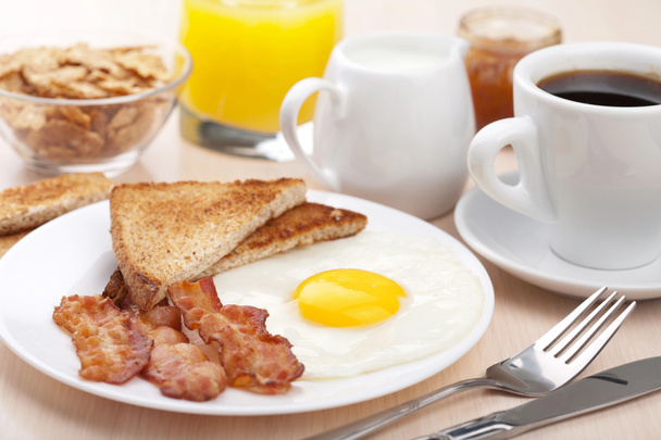 traditional breakfast with fried egg and bacon - Photo, Image