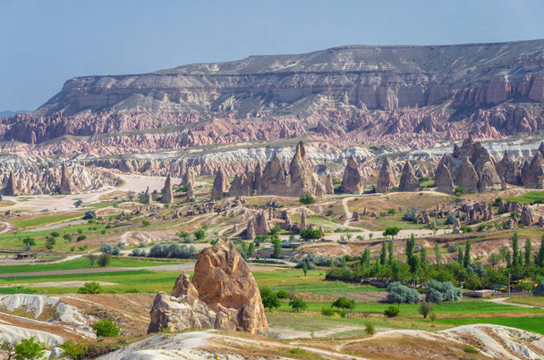 Panoramic view of Cappadocia. Cappadocia is known around the world as one of the best places to fly with hot air balloons. Goreme, Cappadocia, Turkey. Landscape background. - Fotografie, Obrázek